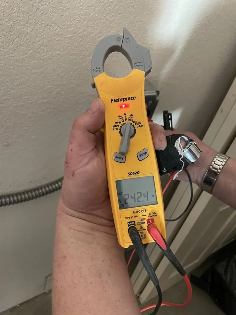 Voltage testing with clamp meter during Aluminum Wiring Replacement in Pittsfield